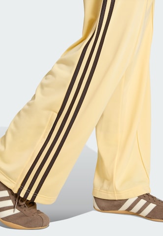 ADIDAS ORIGINALS - Perna larga Calças em laranja