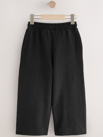 Wide leg Pantaloni di Next in nero