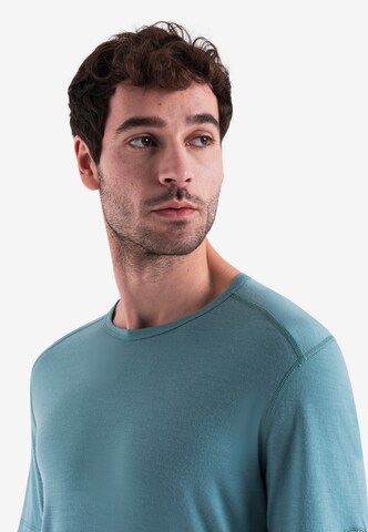 ICEBREAKER Funkcionalna majica 'Oasis' | zelena barva