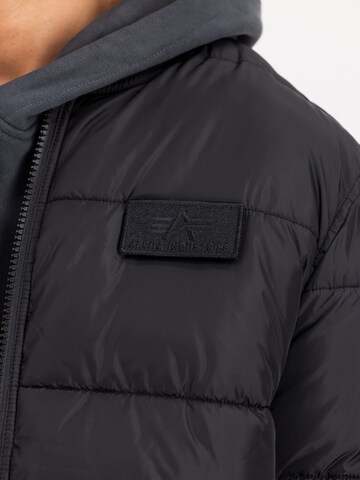 ALPHA INDUSTRIES Between-Season Jacket 'MA-1 Puffer' in Black