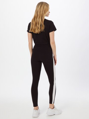 PUMA Skinny Sportbyxa i svart