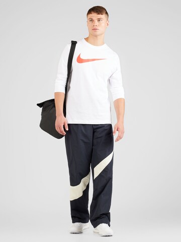 Loosefit Pantaloni di Nike Sportswear in nero