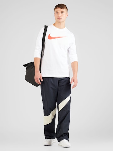 Nike Sportswear Широка кройка Панталон в черно