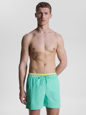 TOMMY HILFIGER Swimming shorts in Green: front