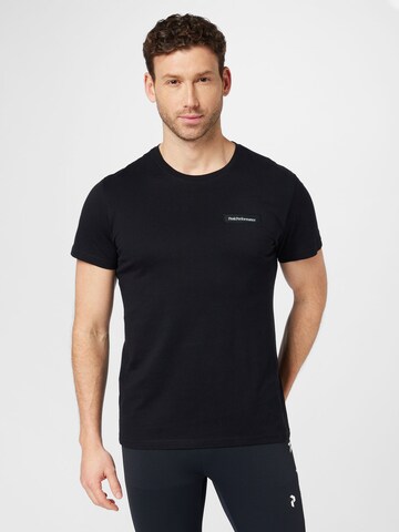 PEAK PERFORMANCE T-shirt i svart: framsida