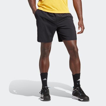 ADIDAS PERFORMANCE Workout Pants in Black: front
