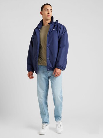 Nike Sportswear Φθινοπωρινό και ανοιξιάτικο μπουφάν 'SOLO SWSH' σε μπλε