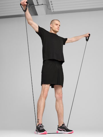 PUMA Функциональная футболка 'Tad Essentials' в Черный