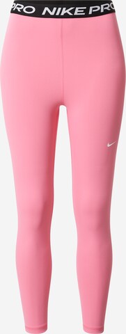 NIKE Skinny Spodnie sportowe w kolorze różowy: przód