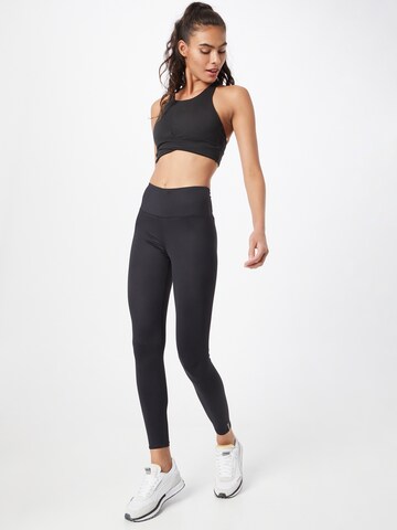 Skinny Pantaloni sportivi di Röhnisch in nero