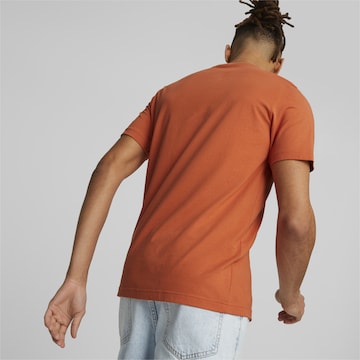 PUMA قميص عملي 'Essential' بلون برتقالي