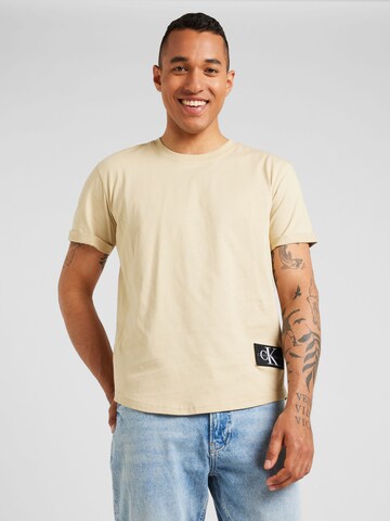 Calvin Klein Jeans Тениска в бежово: отпред