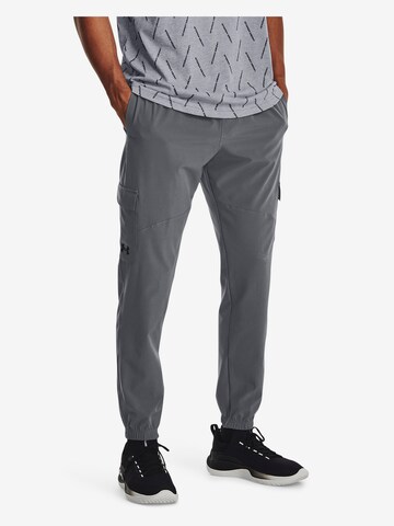 UNDER ARMOUR Tapered Sportbroek in Grijs: voorkant