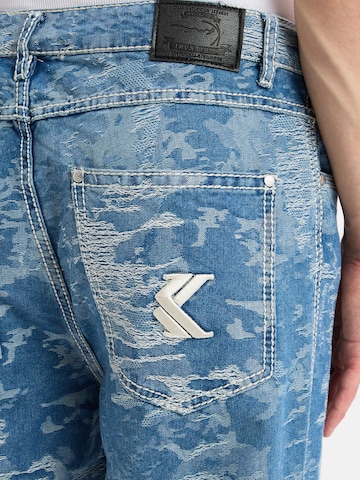 Coupe slim Jean Karl Kani en bleu
