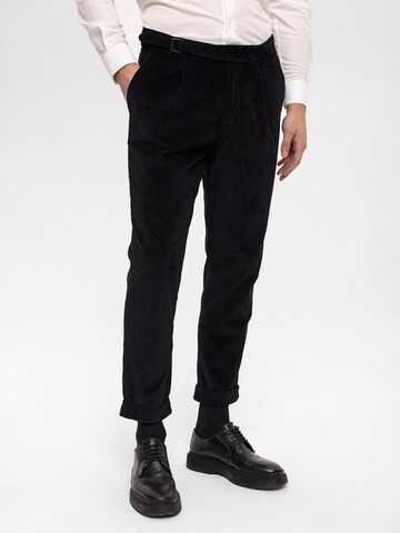 Antioch Tapered Pleat-Front Pants in Black