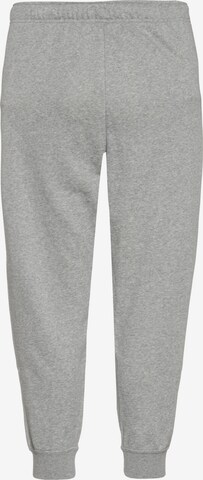 Nike Sportswear Tapered Workout Pants in Grey