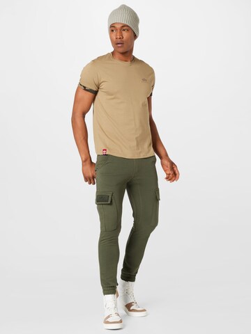 ALPHA INDUSTRIES - Tapered Calças cargo 'Terry Jogger' em verde