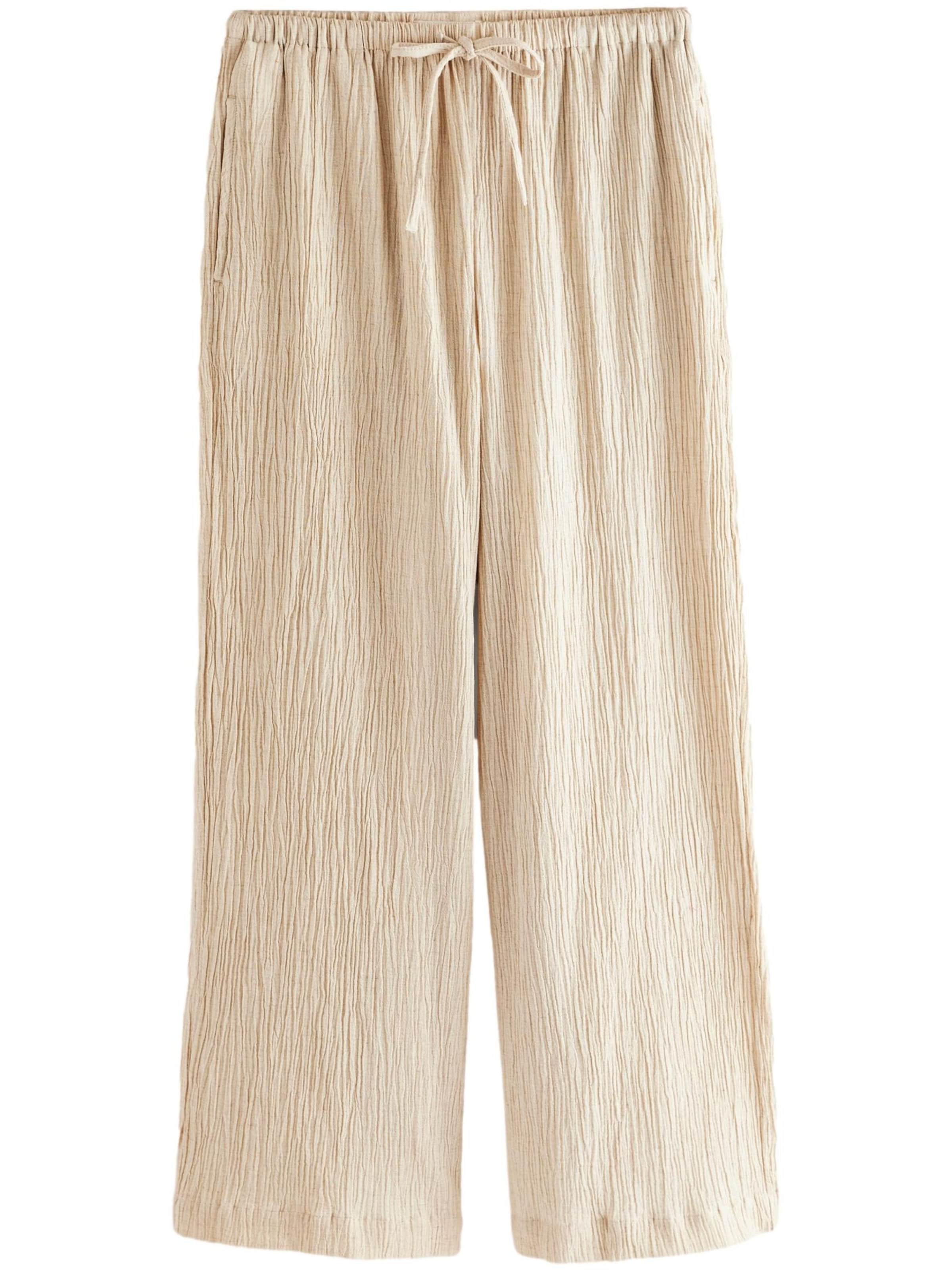 Next - Pierna ancha Pantalón en beige: frente