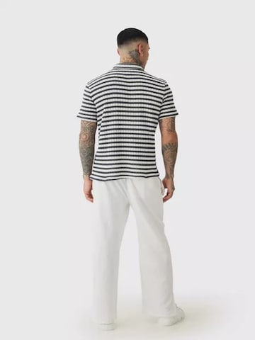 Maglietta 'UNICORN Men's tall striped polo with texture s m' di UNICORN in nero