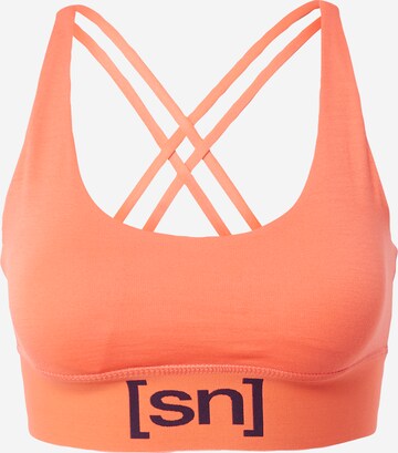 super.natural Sports Bra in Orange: front