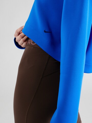 NIKE Sportief sweatshirt 'PRIMA' in Blauw