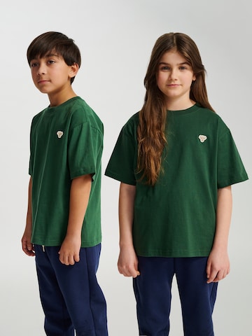 T-Shirt Hummel en vert : devant