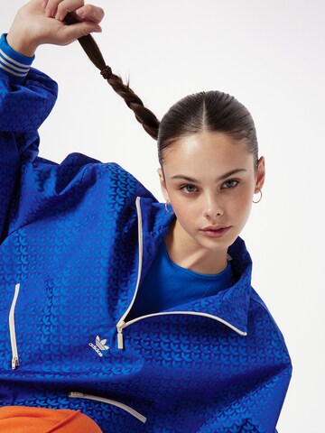 ADIDAS ORIGINALS Tričko 'Adicolor 70S Monogram' – modrá