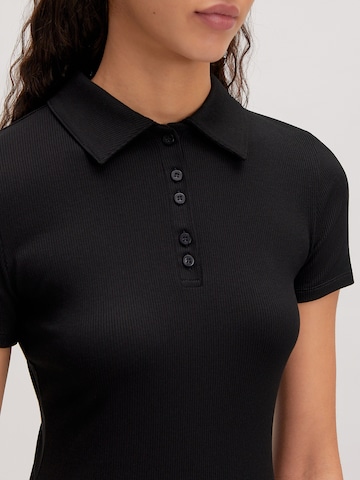 EDITED Poloshirt 'Vania' in Schwarz