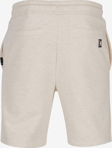 Regular Pantalon Karl Kani en beige