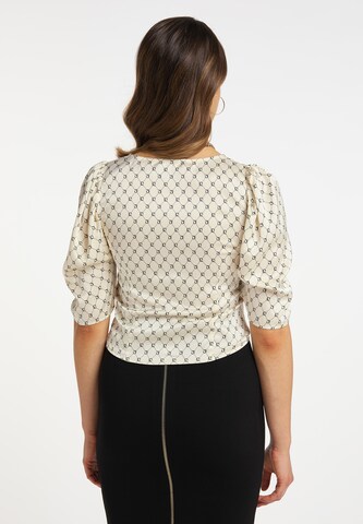 Camicia da donna di faina in bianco