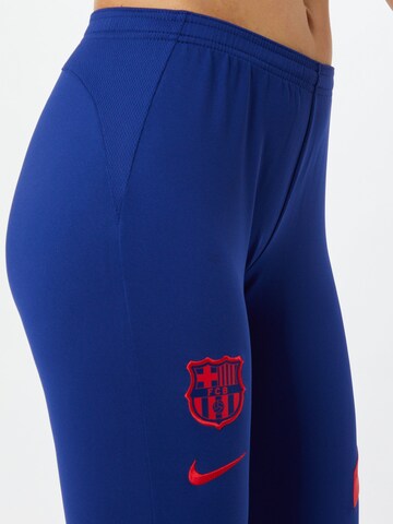 NIKE Skinny Spodnie sportowe 'FC Barcelona Academy Pro' w kolorze niebieski