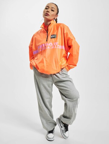 Nike Sportswear Přechodná bunda – oranžová