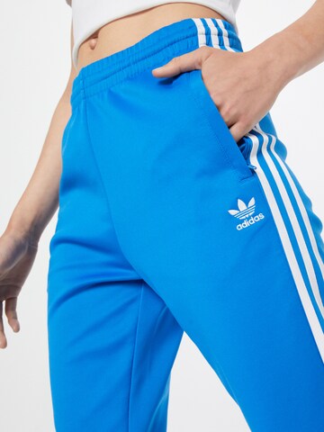 Tapered Pantaloni 'Adicolor Classic' de la ADIDAS ORIGINALS pe albastru