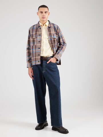 Slim fit Cămașă de la Tommy Jeans pe galben