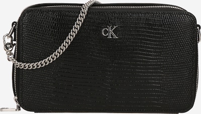 Rankinė su ilgu dirželiu iš Calvin Klein, spalva – juoda, Prekių apžvalga