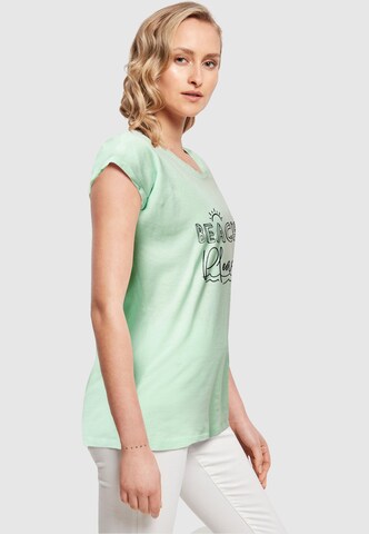 T-shirt 'Beach Please' Merchcode en vert