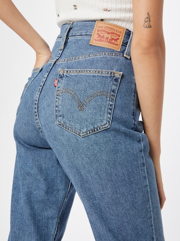 LEVI'S ® Alt kitsenev Teksapüksid 'High Waisted Mom', värv sinine