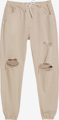 Bershka Jeans in Beige: front