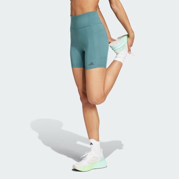 ADIDAS PERFORMANCE Skinny Sports trousers 'Own The Run' in Green: front