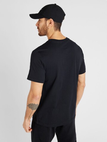 Nike Sportswear T-Shirt 'SOLE RALLY' in Schwarz