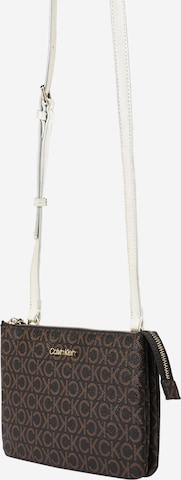 Calvin Klein Crossbody Bag in Brown: front