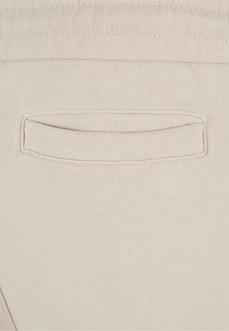 Karl Kani Loose fit Cargo Pants in Beige