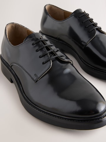 Chaussure à lacets Next en noir