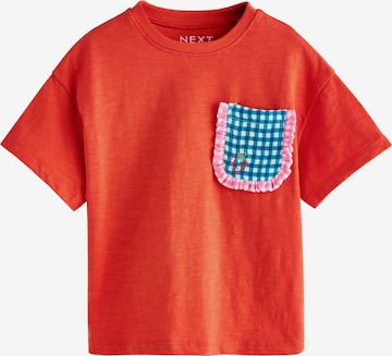 Next Paita värissä punainen: etupuoli