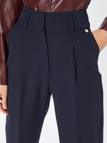 Rich & Royal Tapered Pleat-Front Pants in Blue