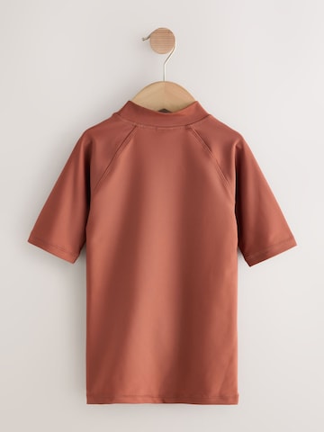 Next - Protección UV en marrón