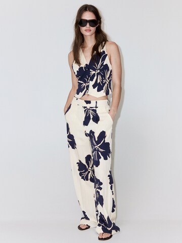 Wide leg Pantaloni con pieghe 'Dotter' di MANGO in bianco
