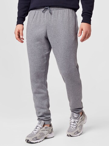 UNDER ARMOUR Конический (Tapered) Спортивные штаны 'Essential' в Серый: спереди