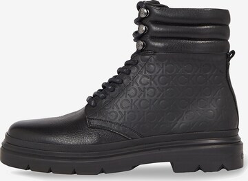 Calvin Klein - Botas con cordones en negro: frente