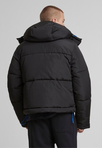 Veste d’hiver Pequs en noir